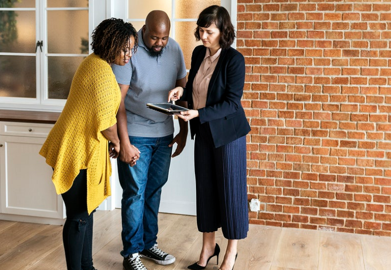 three people discussing